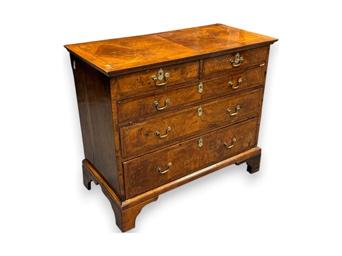 Lot 633 - An 18th century walnut chest of drawers, the...