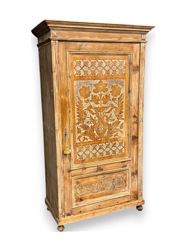 Lot 643 - A European stripped pine wardrobe, with single...