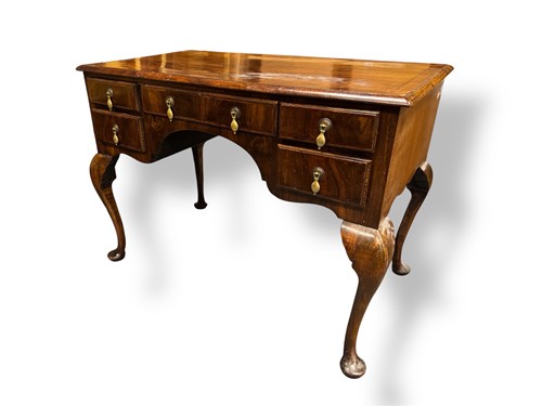 Lot 659 - A George I reproduction kneehole dressing...