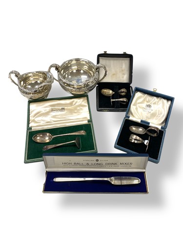 Lot 274 - a silver milk jug and sugar bowl, along with...