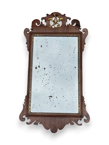 Lot 657 - A George III style fret work wall mirror, with...