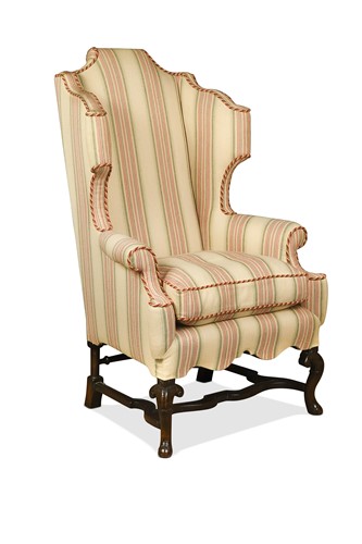 Lot 435 - A William and Mary style walnut wingback armchair