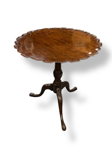 Lot 670 - A George III mahogany tripod wine table, with...