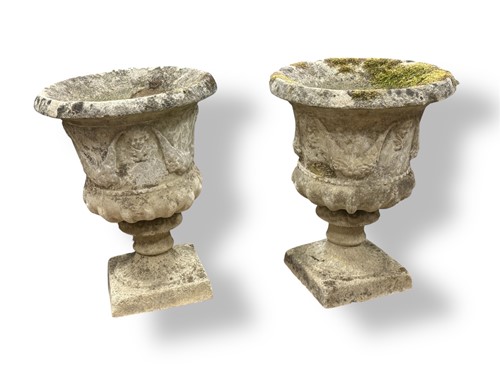Lot 710 - A pair of composite stone garden planters of...