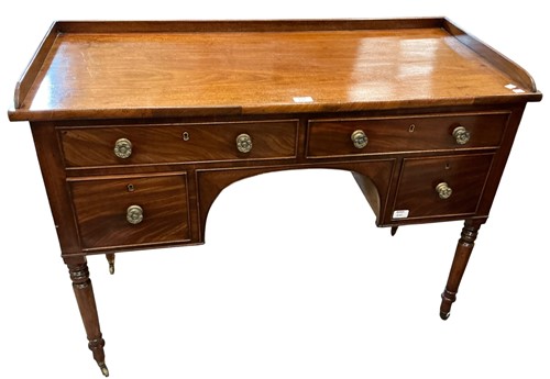 Lot 610 - Regency mahogany dressing table, two frieze...