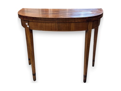 Lot 563 - George III demi-lune mahogany table with fine...