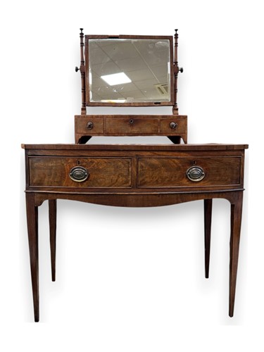 Lot 555 - A 19th century bowfront sideboard set with two...