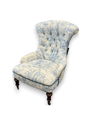Lot 565 - A Victorian nursing chair, deep buttoned...