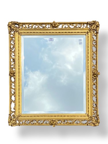 Lot 538 - A pierced and gilt framed mirror with acanthus...