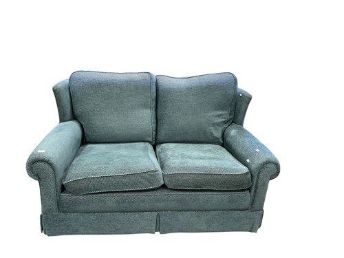 Lot 611 - A modern 2 seater sofa upholstered in blue...