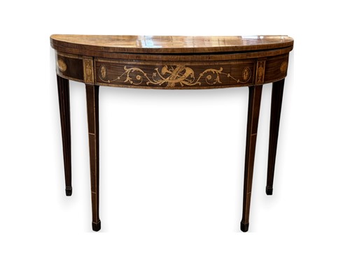 Lot 564 - George III mahogany demi-lune tea table, the...