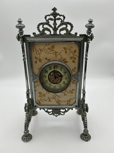 Lot 125 - An early 20th century metal easel mounted...