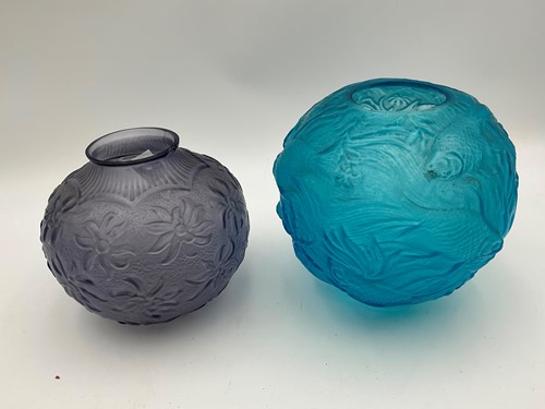 Lot 124 - Two 20th century moulded glass shades, one...