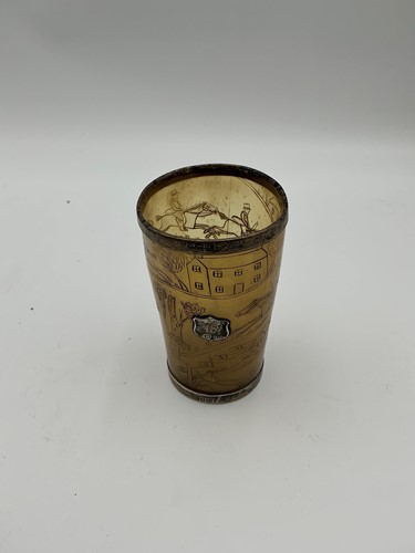 Lot 123 - A 19th-century silver-mounted engraved horn...