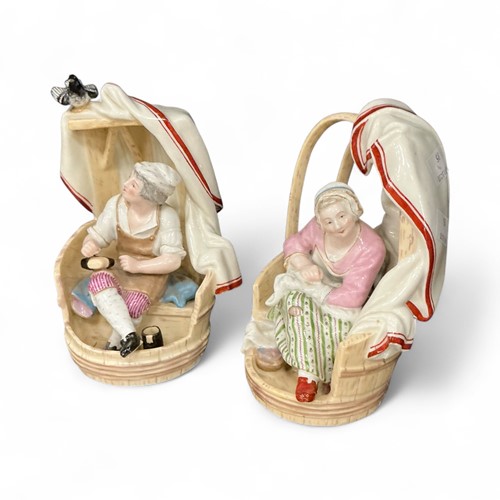 Lot 1 - A pair of pottery figure groups of a cobbler...