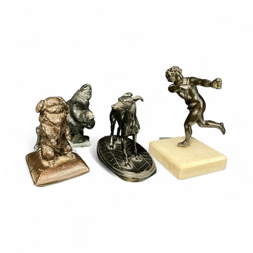 Lot 128 - A bronze model of a pekingese dog, a bronze...