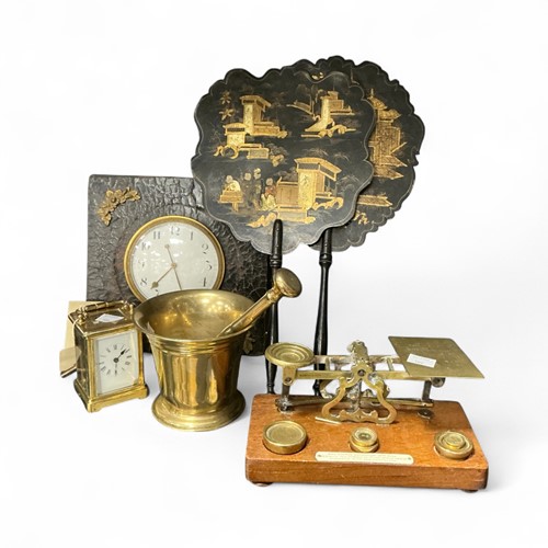 Lot 166 - Bronze pestle and mortar, a desk clock, a...