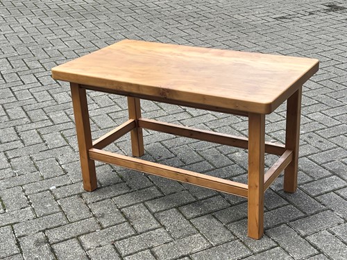 Lot 528 - A contemporary maple wood coffee table, the...