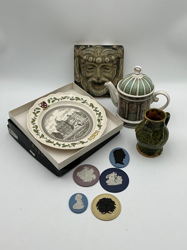 Lot 91 - A Maw & Co relief moulded mask tile, a...