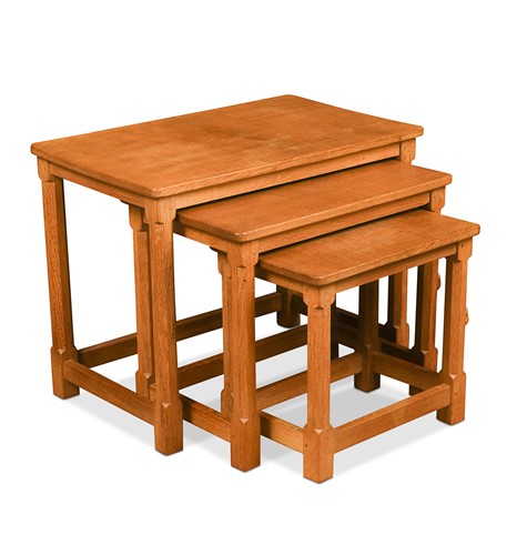 Lot 378 - Workshop of Robert 'Mouseman' Thompson (Kilburn), a nest of three English oak tables