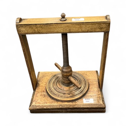 Lot 162 - A mahogany book or flower press, 19th century