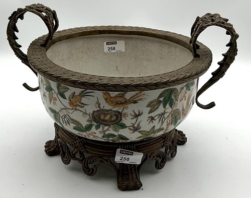 Lot 258 - A decorative circular bowl or jardiniere...