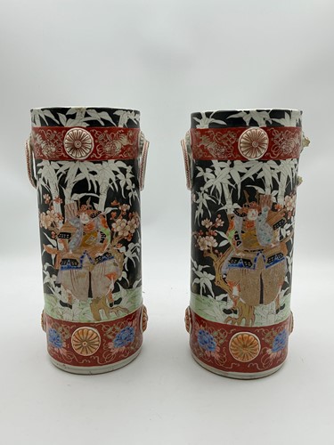 Lot 133 - A pair of Japanese two-handled famille noir...