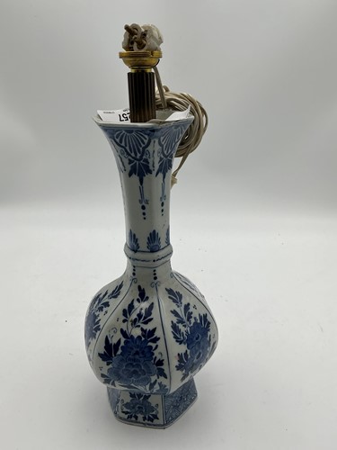 Lot 257 - A blue and white flask shaped vase, converted...