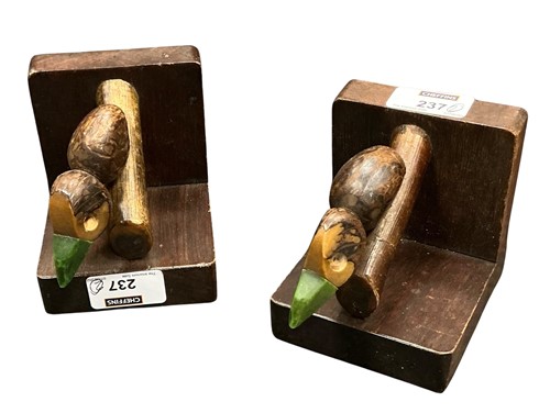 Lot 237 - Pair of bookends in the form of stylised...