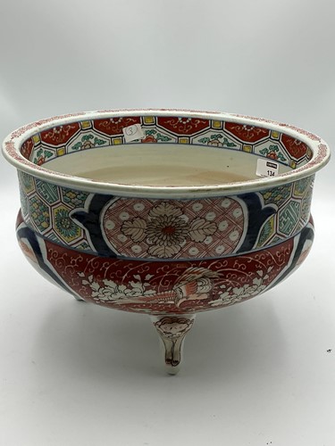 Lot 134 - A large Japanese porcelain jardiniere, raised...