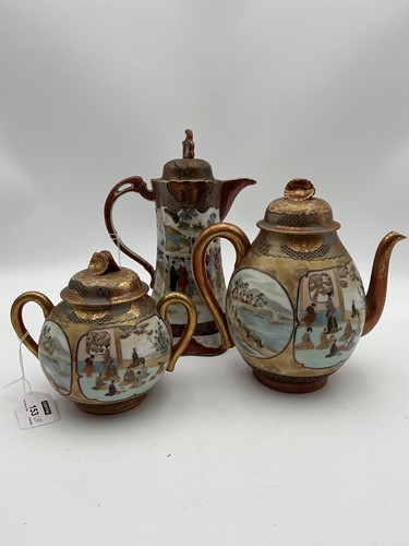 Lot 153 - A Japanese satsuma teapot and cover and a...