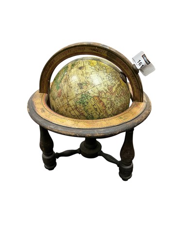 Lot 161 - A globe and stand