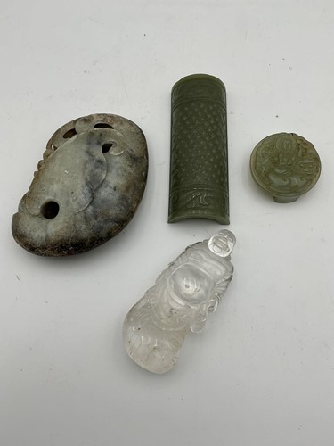 Lot 157 - Three items of jade and a rock crystal Buddha