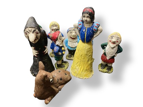 Lot 566 - An amusing group of 1950s composite stone...