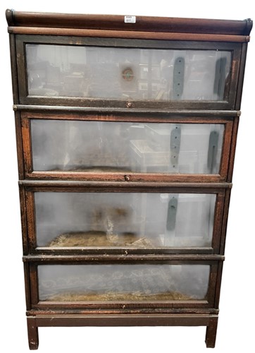 Lot 617 - Globe Wernicke - an oak sectional bookcase,...
