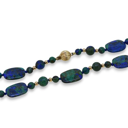 Lot 47 - A lapis with malachite bead necklace, together with a pair of ear studs