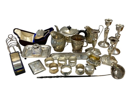 Lot 256 - A collection of silverware including teapot,...