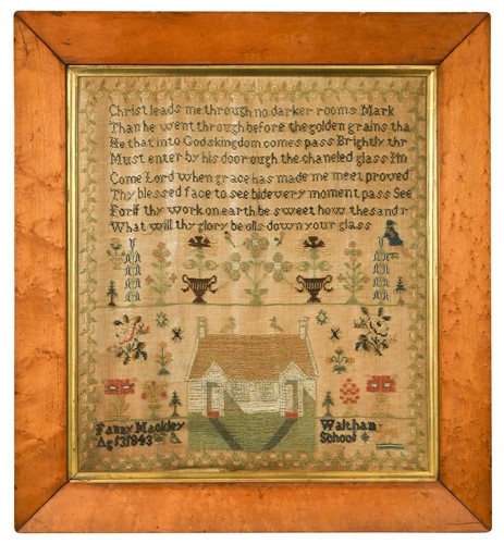Lot 348 - A Victorian maple-framed needlework sampler