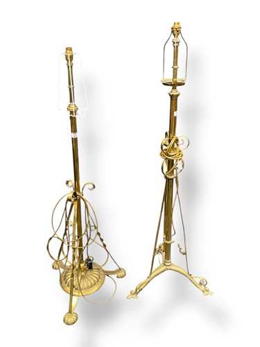 Lot 699 - A brass standard lamp with triform splayed...