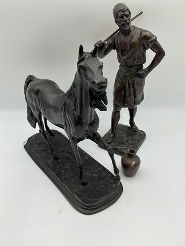 Lot 118 - A bronze model of a horse, 20th century...