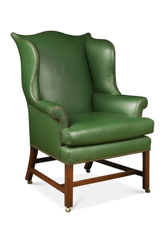 Lot 600 - A studded green leather wingback armchair, 18th century