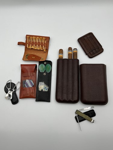Lot 150 - A Mulberry leather cased set of Golf tees,...