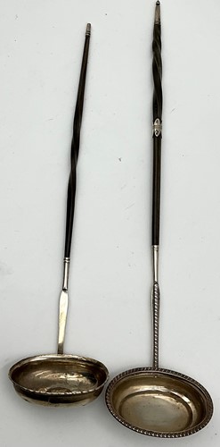 Lot 259 - A George II silver punch ladle with baleen...