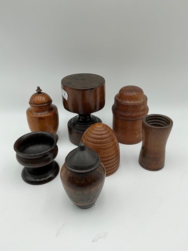 Lot 171 - A small collection of treen jars, pots and...