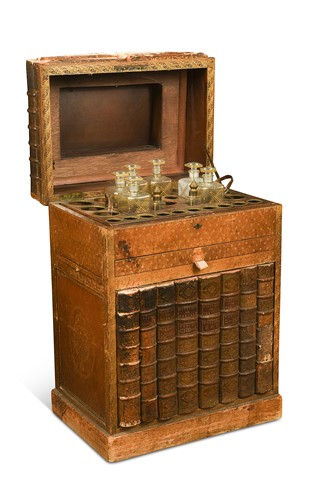 Lot 548 - A faux book drinks cabinet by Finnigans, Bond Street, early 20th century