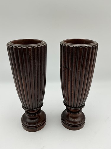 Lot 172 - A pair of treen vases with reeded bodies 26cm...