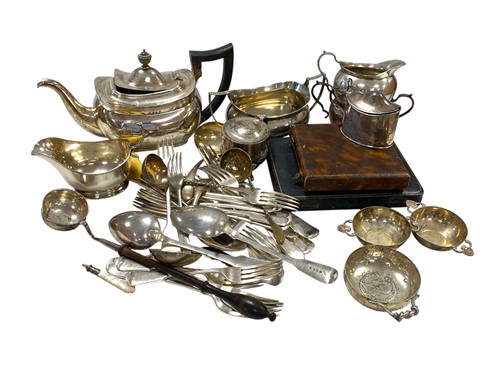 Lot 239 - A collection of silverware including sauce...