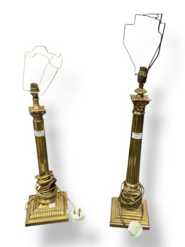 Lot 676 - Two similar brass columnar table lamps 55cm...