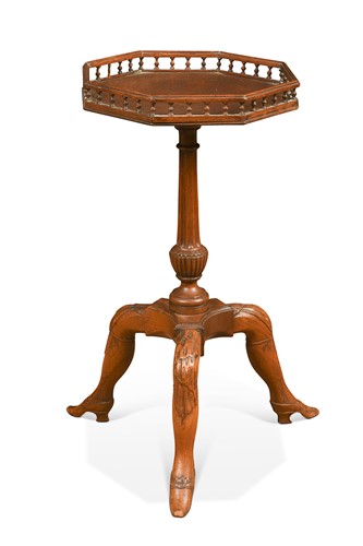 Lot 619 - A George III carved mahogany "Manx" tripod table