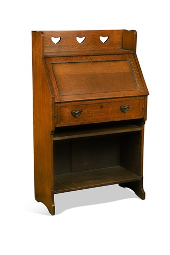 Lot 349 - Liberty & Co., a stained oak 'Chaucer' bureau, circa 1905